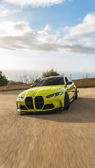 Yellow BMW M3 Competition